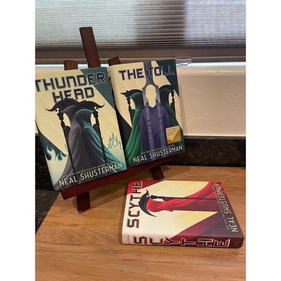 The Arc Of A Scythe Trilogy Books: one is signed